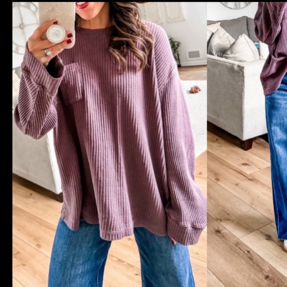 Oversize waffle long sleeve top with a pocket.
We the Free chocolate/grape color